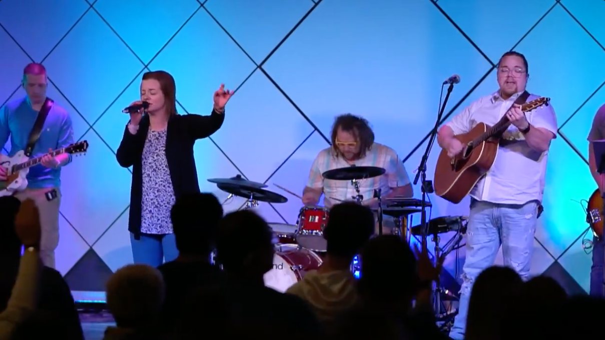 Luke and Jess Knoll leading worship together